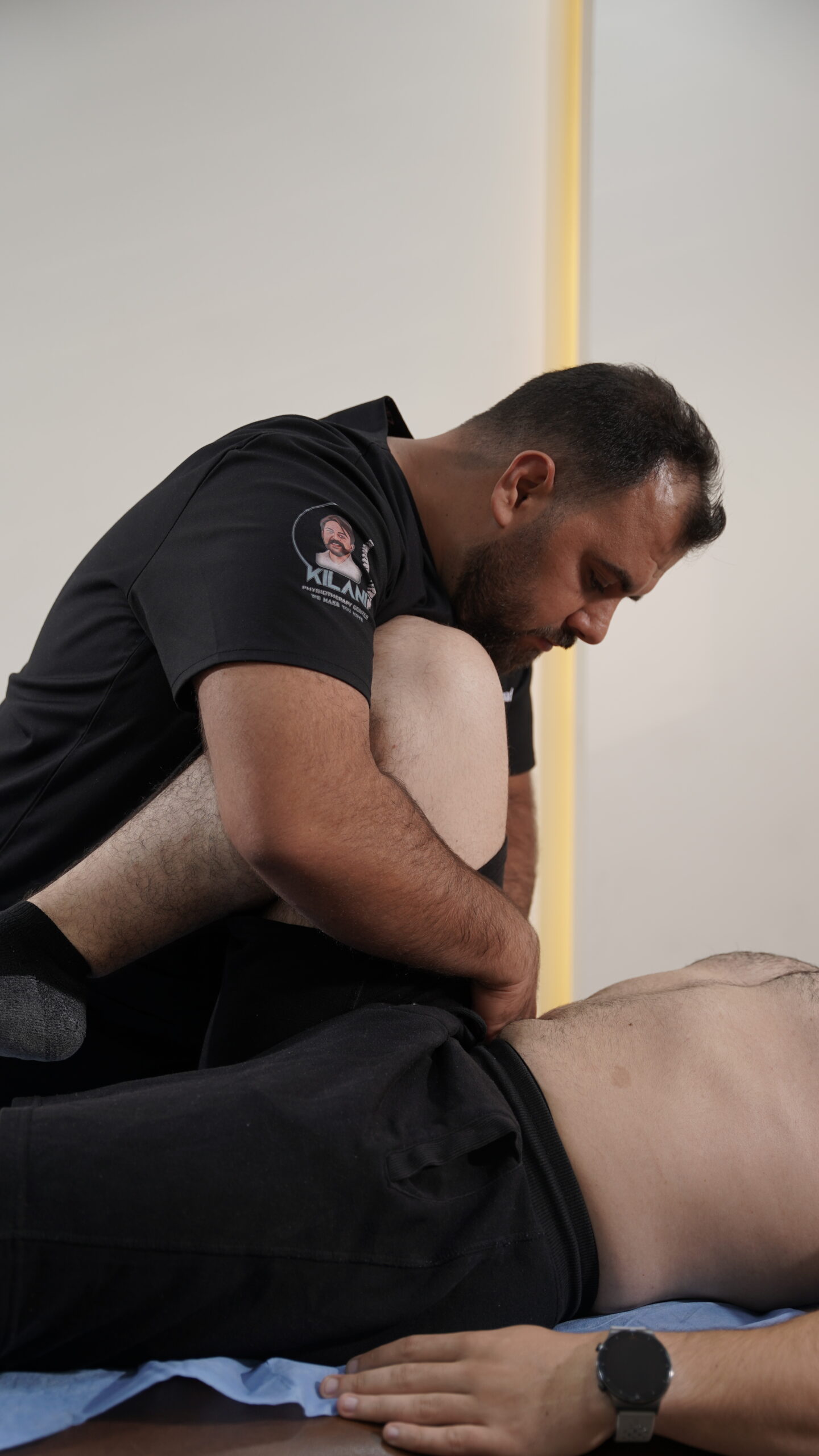 Physiotherapist guiding patient through posture correction exercises